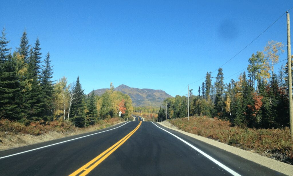 Scenic drive through Ontario to British Columbia, Canada: Majestic mountains, winding roads, and lush landscapes.