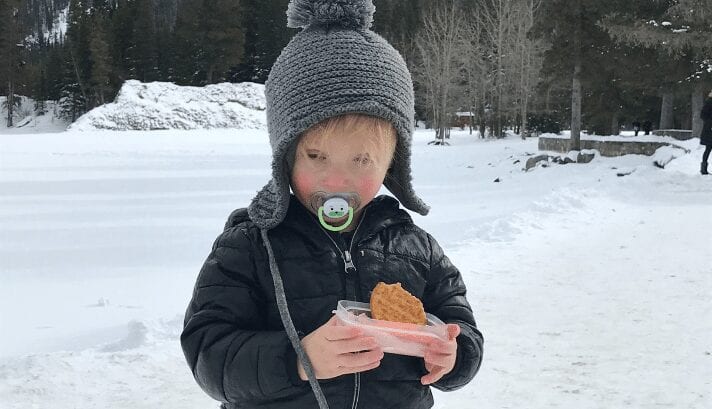 My little one eating his snacks wudring our winter trip.