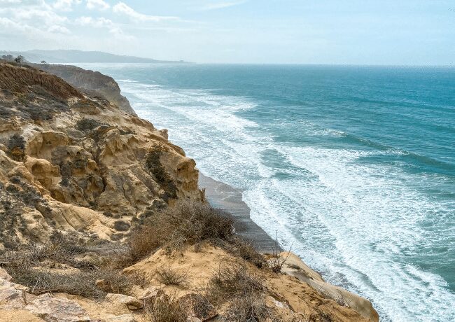 Experience the natural beauty and rugged elegance of Torrey Pines State Natural Reserve. This coastal gem in San Diego, California, offers visitors a chance to explore unique landscapes with its iconic Torrey Pines trees, scenic hiking trails, and breathtaking ocean views.