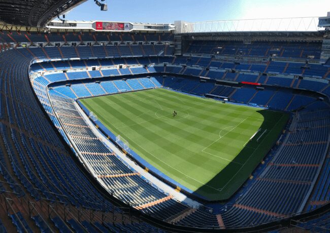 The biggest sport in Spain, Soccer! and the biggest staduim at Santiago Bernabéu Stadium.