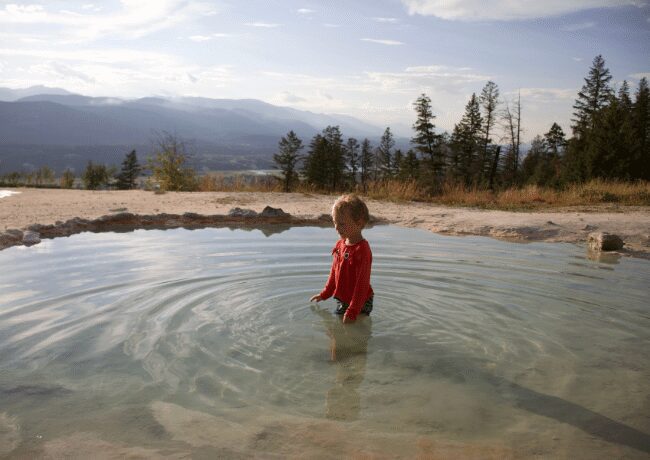 My son soaking in the natural hot springs in Fairmont Hot Spring