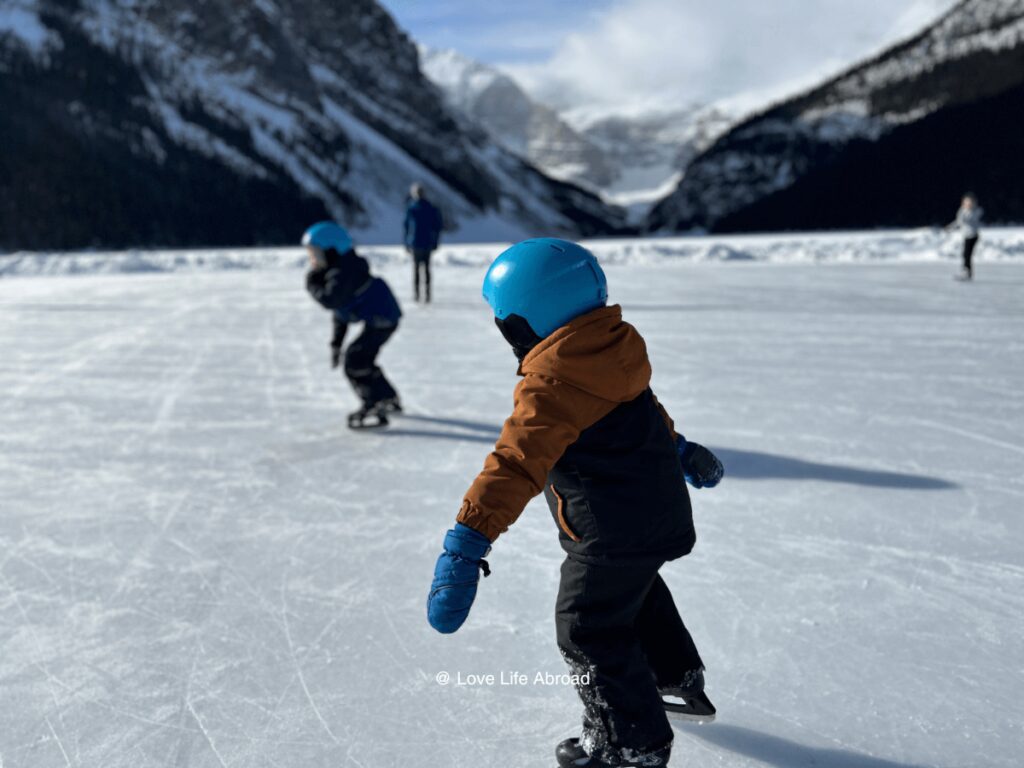 ice skating on lake louise in the winter