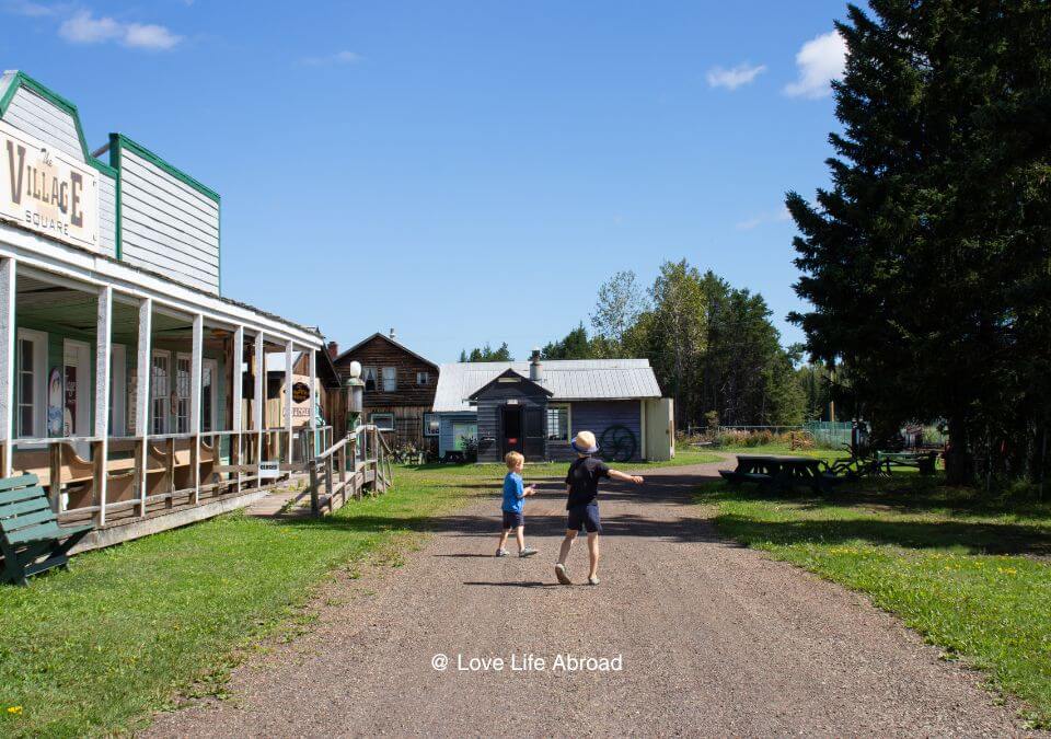 Kids walking around Oliver Paipoonge Heritage Park near Thunder Bay