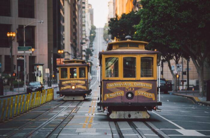 A San Francisco cable car is an iconic mode of transportation in the city, taking passengers up and down the famous hills for over 150 years. It's a unique and convenient way to explore the area and take world-famous views.