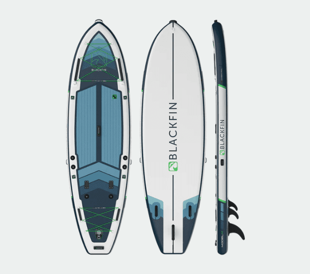BLACKFIN MODEL X 2023 Inflatable Paddle Board in Fuchsia Blue - in color blue gold.  A premium SUP with Triple Layer PVC Construction, Built-in Carbon Rail, and Reinforced Seams for top-notch performance and durability on the water.