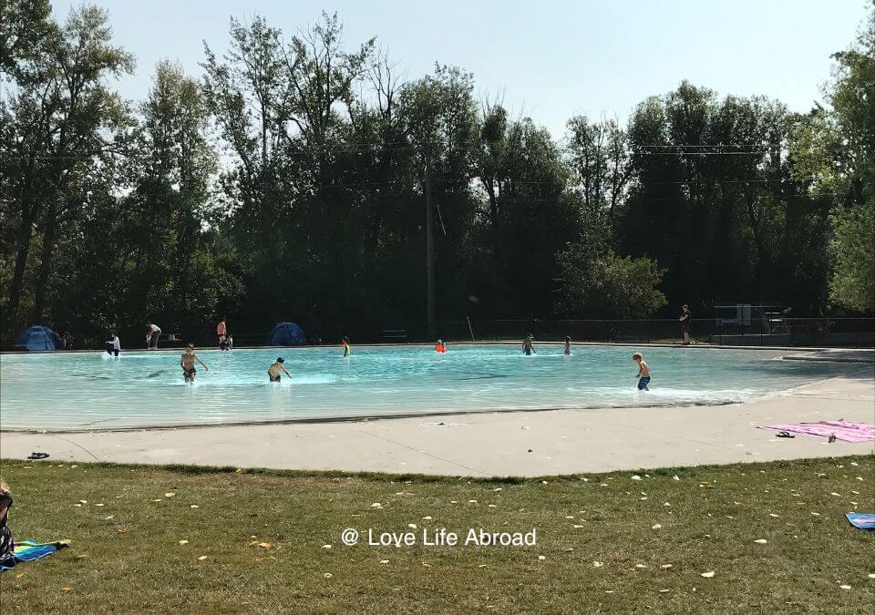 Enjoying the wading pool in the summer at Bowness Park in Calgary