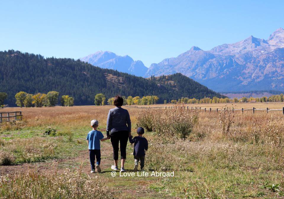 Family with young kids exploring Grand Teton National Park